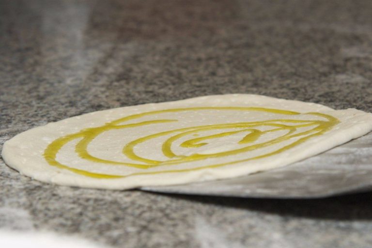 Oilve Oil on Pizza